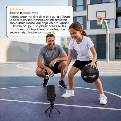 Un père et sa fille pendant une session de dribble Beatballer