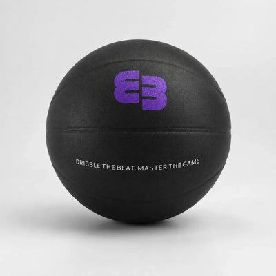 Silent Beatball® noir avec slogan Dribble the beat. Master the game., conçu pour travailler le dribble à la maison.